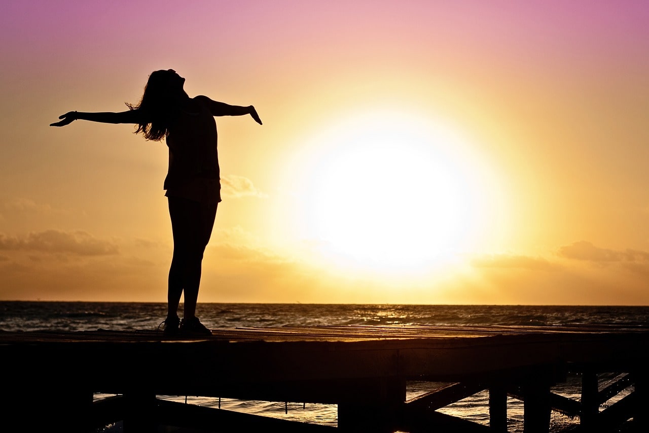 woman watching the sun