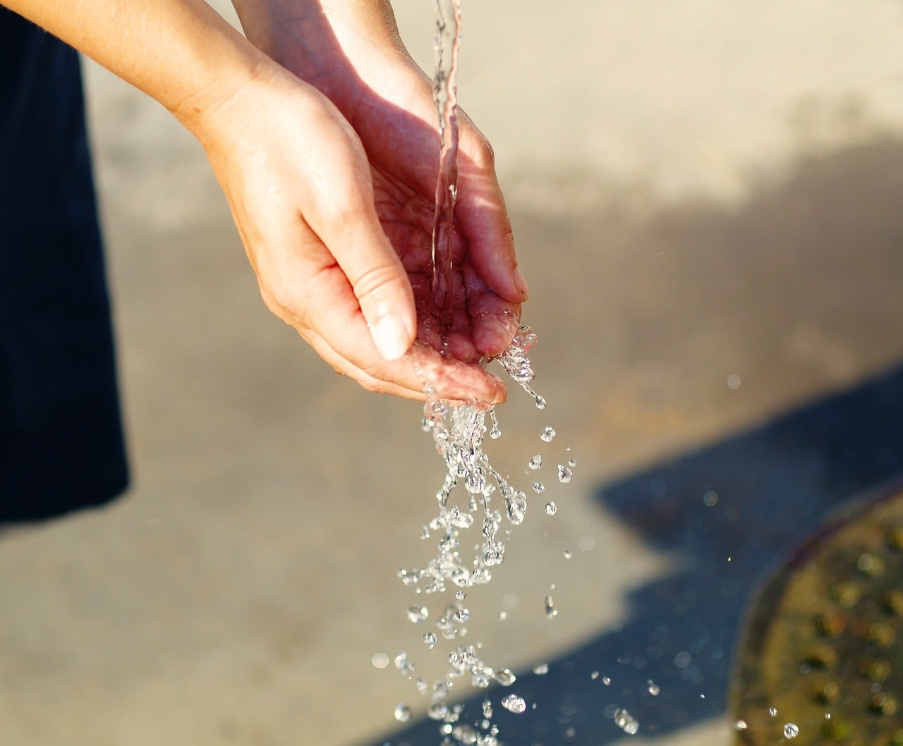 washing hands with tap water