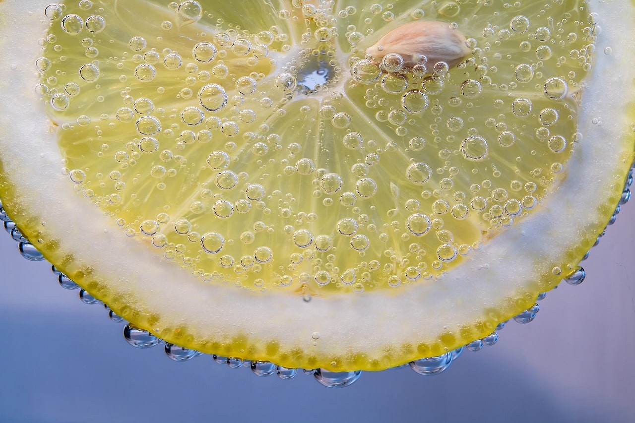 slice of lemon dipped in water