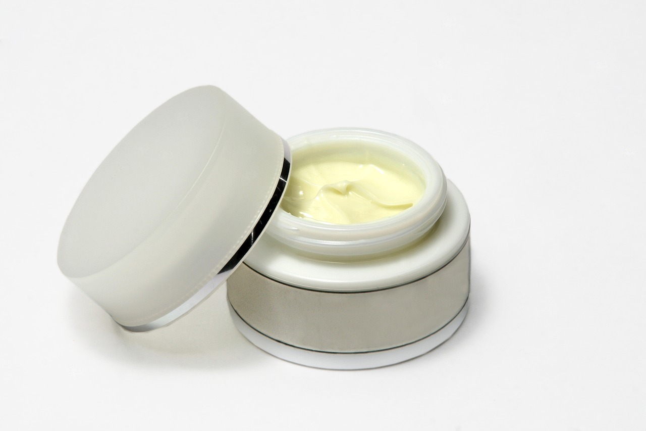 an open container with an eye cream