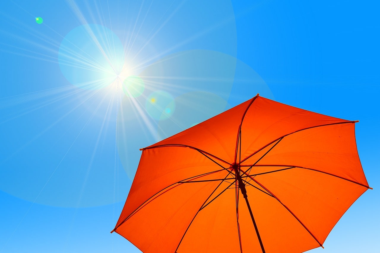 an umbrella under the hot sun